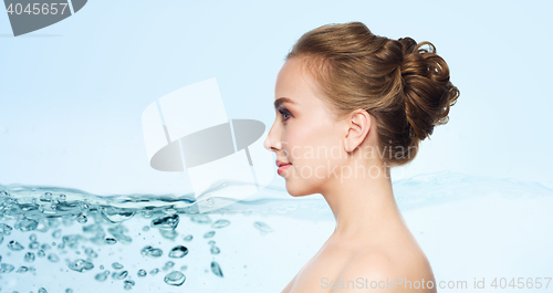 Image of beautiful young woman face over white background