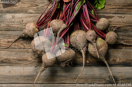 Image of Beetroots on wooden background