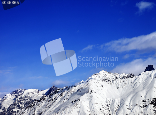 Image of Snow mountain at sunny winter day.