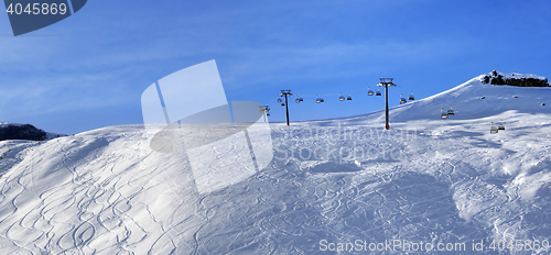 Image of Panoramic view on sunlight off-piste slope at morning