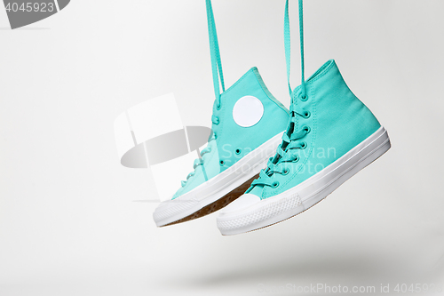 Image of Pair of shoes over white background