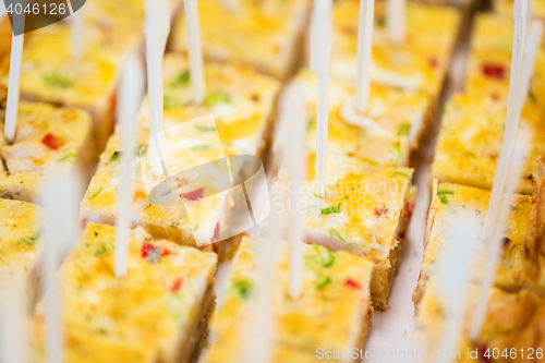Image of close up of served casserole or quiche pieces