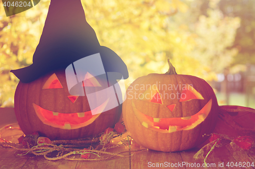 Image of close up of pumpkins on table outdoors