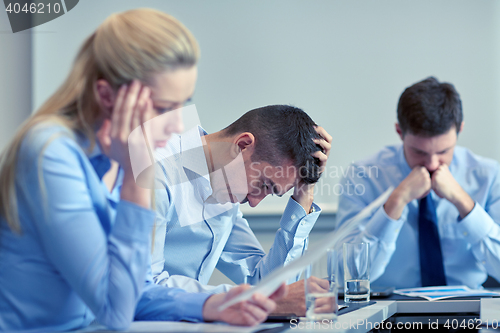 Image of business people having problem in office