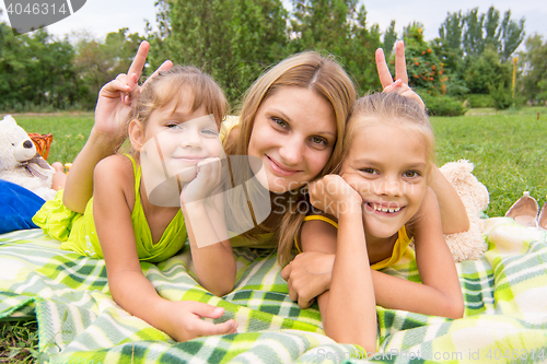 Image of Mom horns and offered two daughters and a fun look into the frame