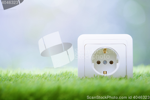 Image of Electric outlet in the grass