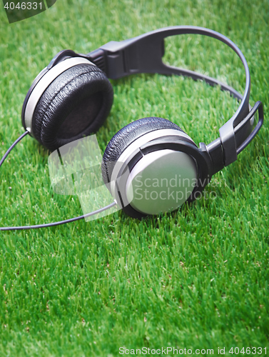 Image of Headphones in a grass