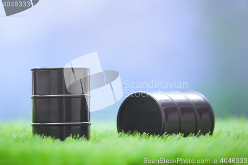 Image of Oil barrels in the grassland