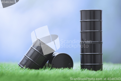 Image of Oil barrels in the grassland