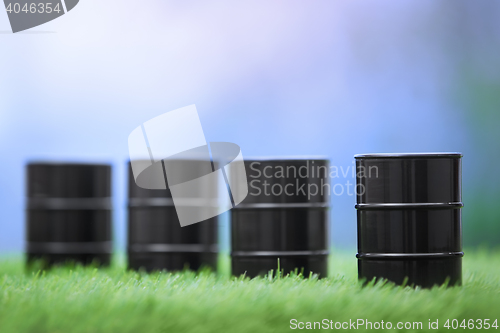 Image of Oil barrels in the grassland