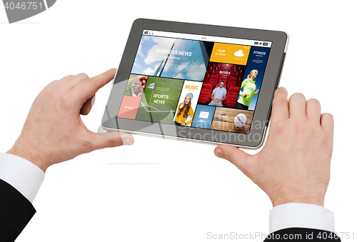 Image of close up of hands holding tablet pc with