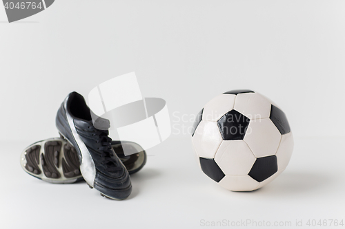 Image of close up of soccer ball and football boots