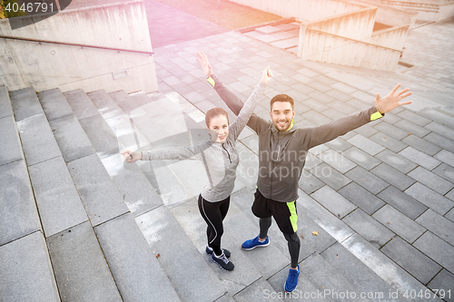 Image of happy smiling couple outdoors on city street