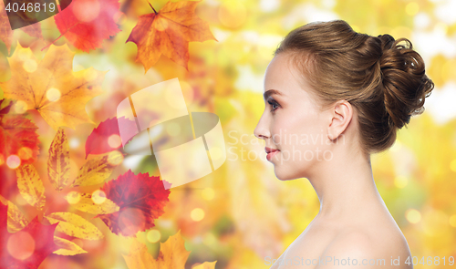 Image of beautiful young woman face over white background