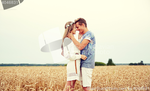 Image of happy smiling young hippie couple outdoors