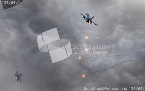 Image of Fighter jets flying fast 