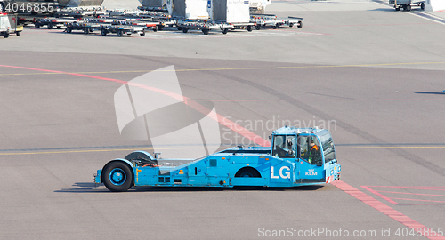 Image of AMSTERDAM, THE NETHERLANDS - JULY 19: Large KLM aircraft tug at 
