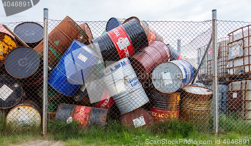 Image of AKRANES, ICELAND - AUGUST 1, 2016: Oil barrels or chemical drums