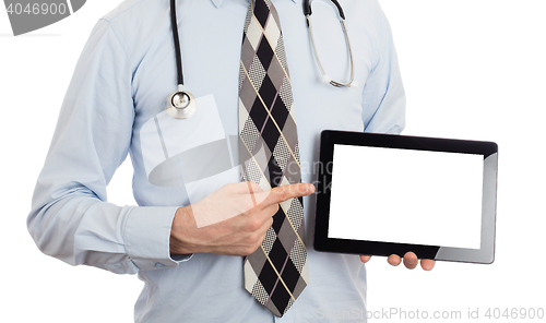 Image of Doctor holding tablet with copy space and clipping path for the 