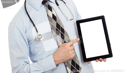 Image of Doctor holding tablet with copy space and clipping path for the 