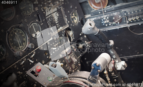 Image of Center console and throttles in airplane