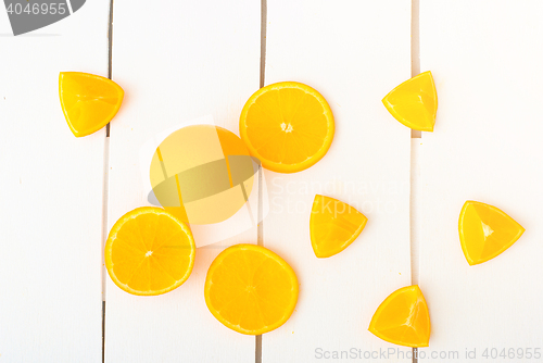 Image of Colorful citrus fruits on the rustic white background.