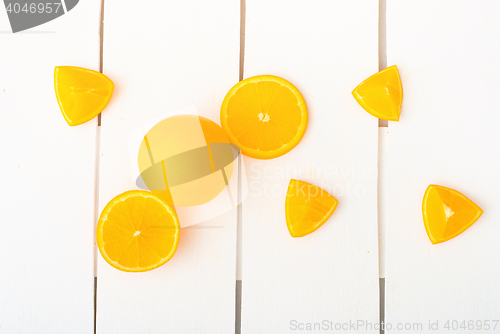 Image of Colorful citrus fruits on the rustic white background.