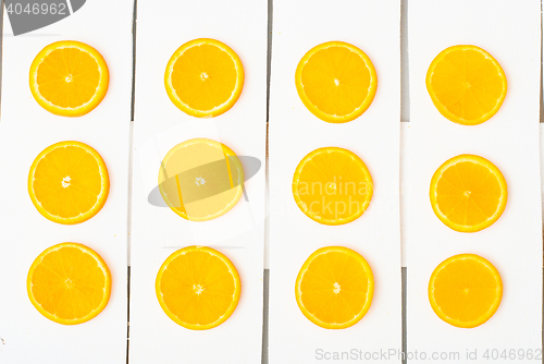 Image of Colorful citrus fruits on the rustic white background.