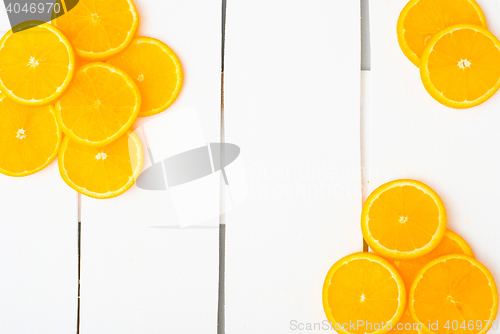 Image of Colorful citrus fruits on the rustic white background.