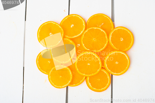 Image of Colorful citrus fruits on the rustic white background.