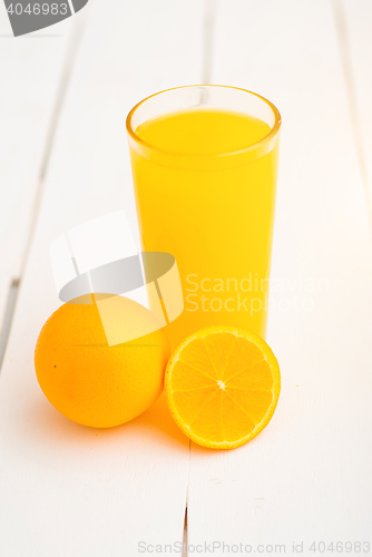 Image of Colorful citrus fruits on the rustic white background.