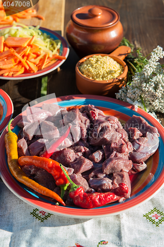 Image of Russian table with raw meat