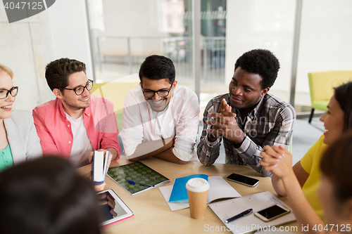 Image of group of high school students sitting at table