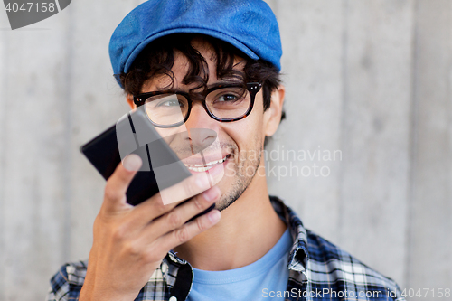 Image of man using voice command or calling on smartphone