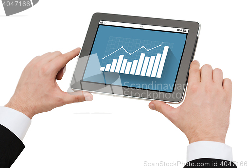 Image of close up of hands holding tablet pc with graph