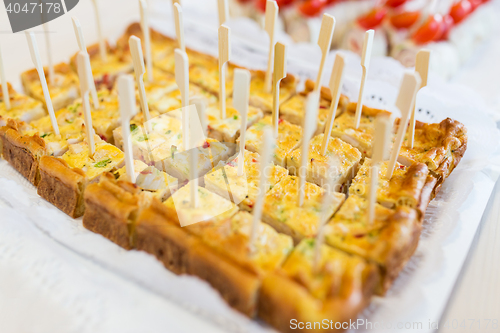 Image of close up of served casserole or quiche pieces