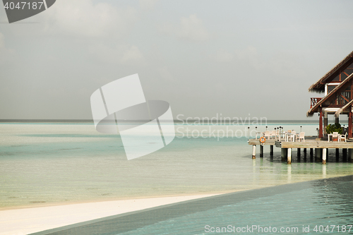 Image of patio or terrace with canopy on beach sea shore