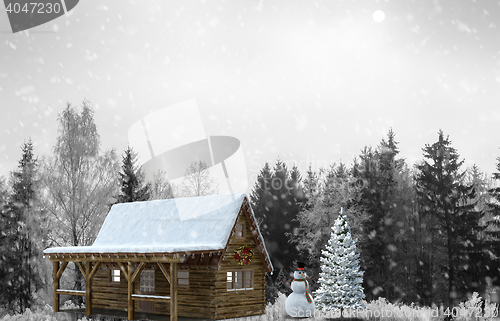 Image of Snowman in the woods near the festive Christmas tree.