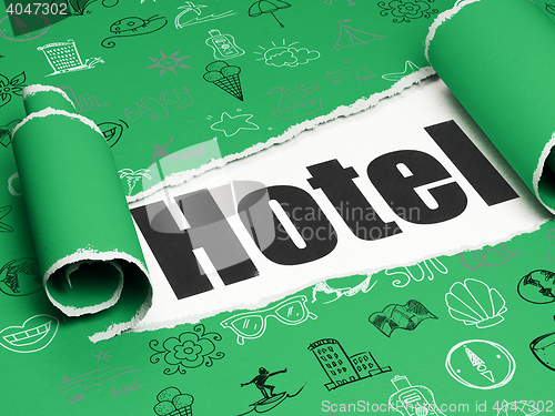 Image of Vacation concept: black text Hotel under the piece of  torn paper