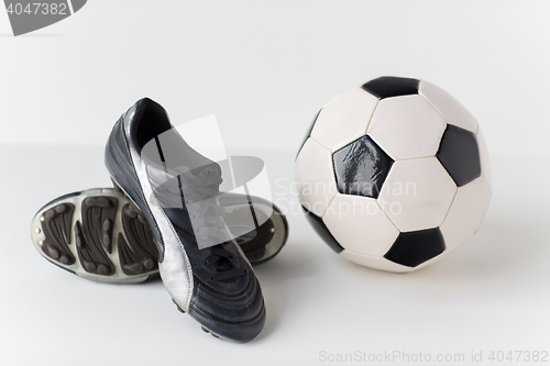 Image of close up of soccer ball and football boots