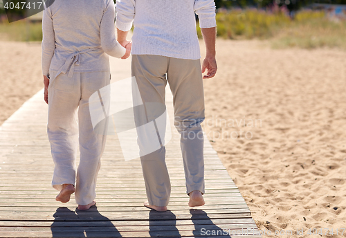 Image of close up of senior couple on summer beach