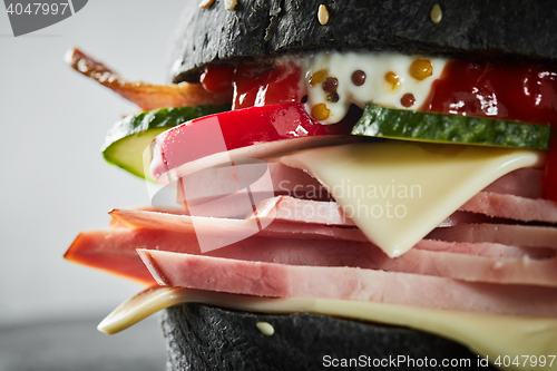 Image of Burger with ham and black bun