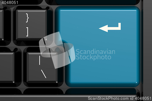 Image of Blue enter key on black keyboard