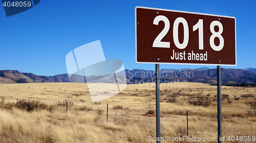 Image of 2018 Just Ahead brown road sign