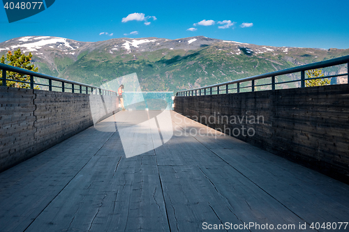 Image of Woman enjoying scenics from Stegastein Viewpoint