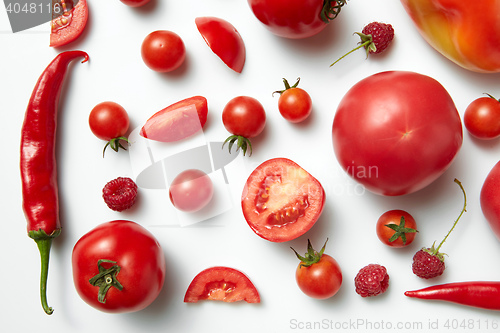 Image of Red chili pepper and tomato .