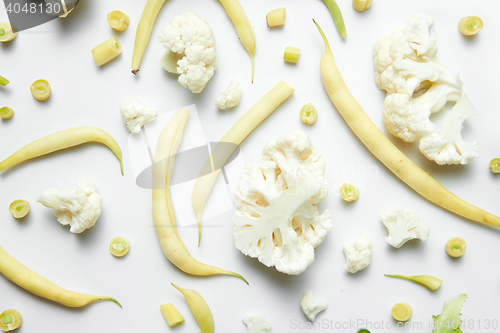Image of cauliflower and beans on white background