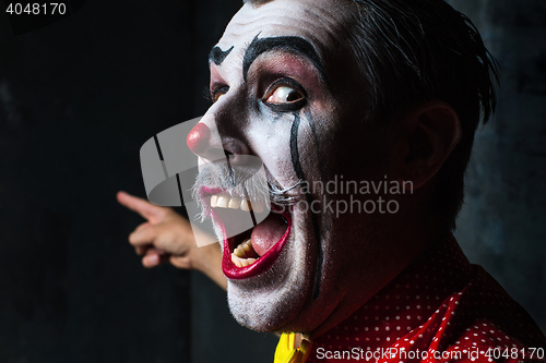 Image of Terrible crazy clown and Halloween theme