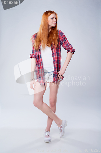 Image of Full length beautiful red haired teen girl