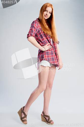 Image of Full length beautiful red haired teen girl